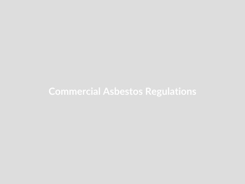 School building with asbestos management signage